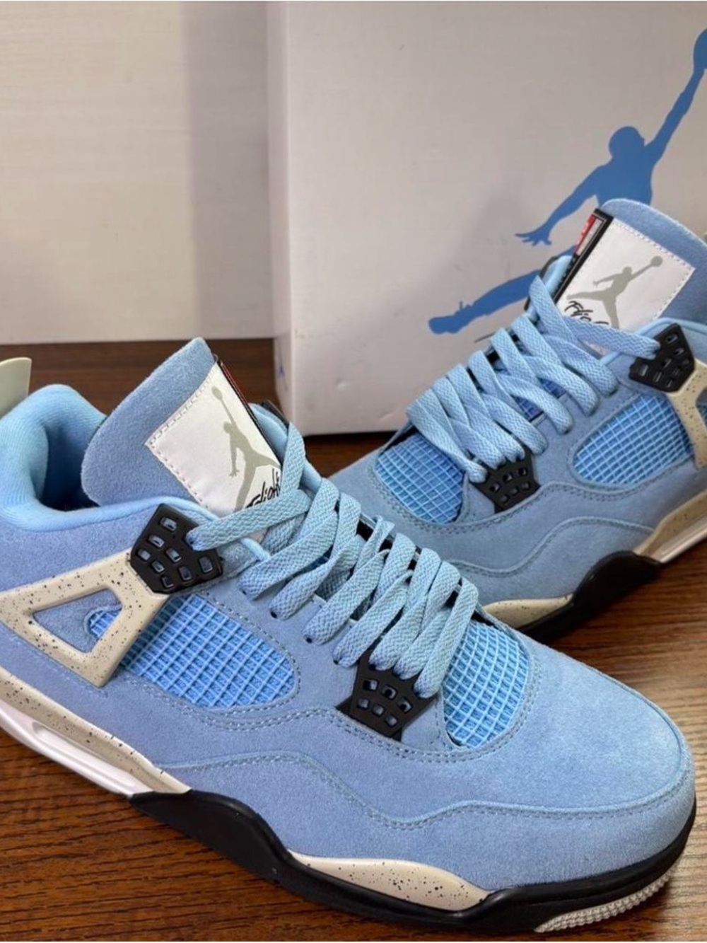 Jordan Kids' Air Jordan 4 Retro in University Blue and Black